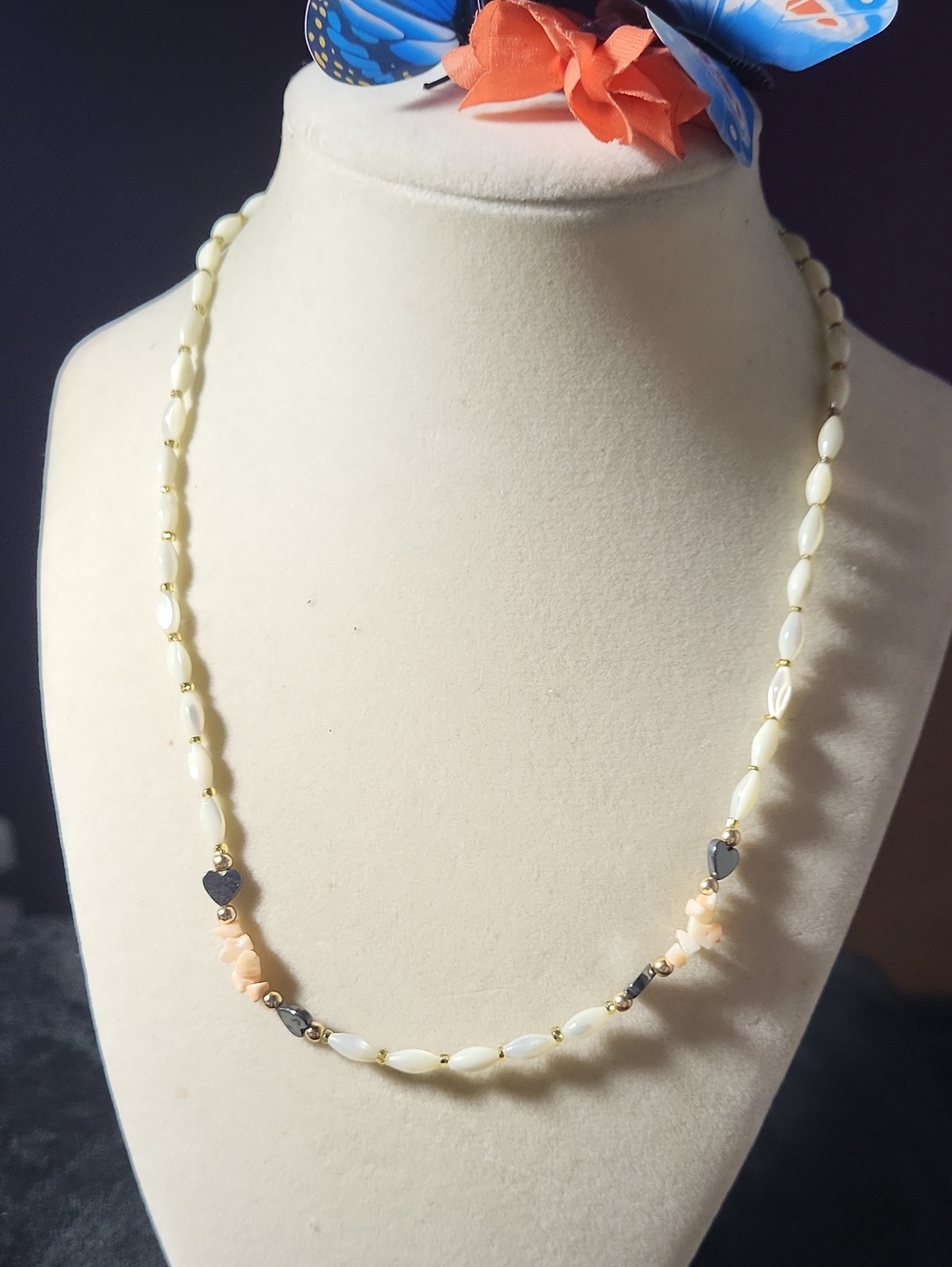 Elegant White and Peach Bead Necklace with Accents